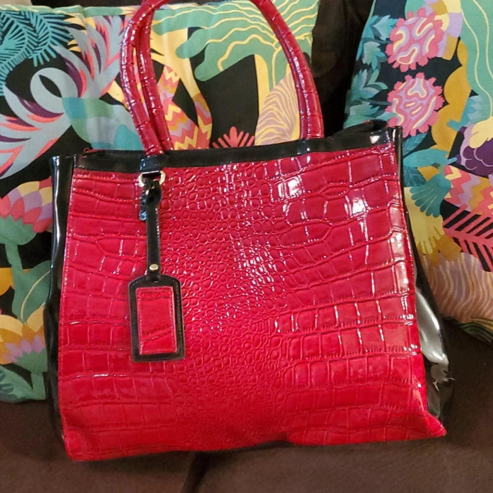 Red leather tote bag with snap closure